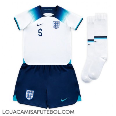 Camisa de Futebol Inglaterra John Stones #5 Equipamento Principal Infantil Mundo 2022 Manga Curta (+ Calças curtas)